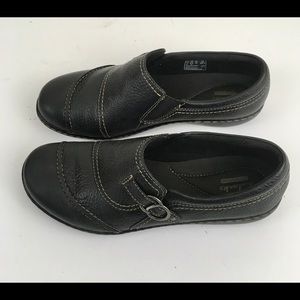 Clark’s women’s black leather flats.